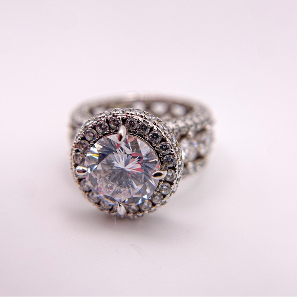 Round cut cubic zirconia silver toned ring with round accents. Size 5. - Picture 10 of 14